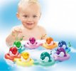 000.005.831 Tomy Toomies Do-Re-Mi Dolphins bath toys